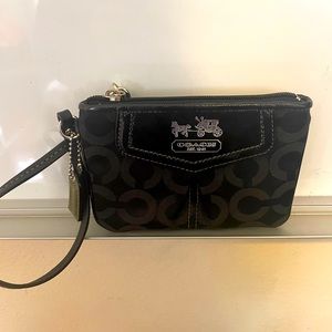 Coach women’s corner zip wristlet with signature canvas vintage
